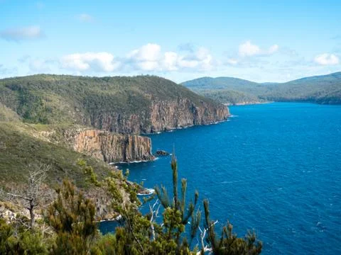 Mountain range over ocean Stock Photos