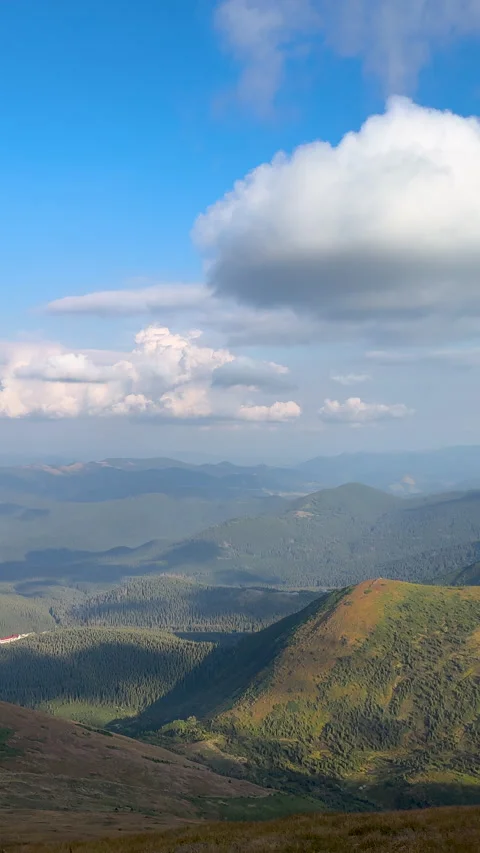 Mountain range panorama with dynamic cloud formation Stock Footage 293143954