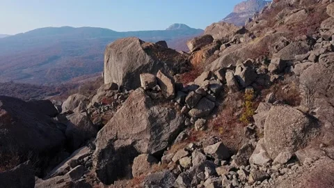 Mountain range seen from above. Dron flying over steep mountain sides Stock Footage 169445698