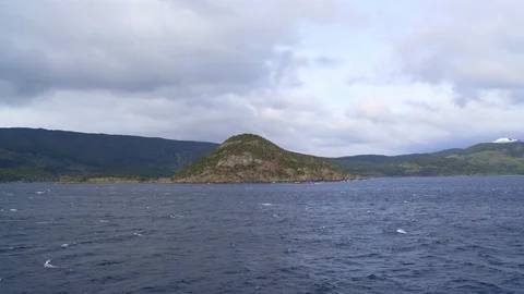 A mountain range seen from a ship in the Cape Horn area Видео 109509027