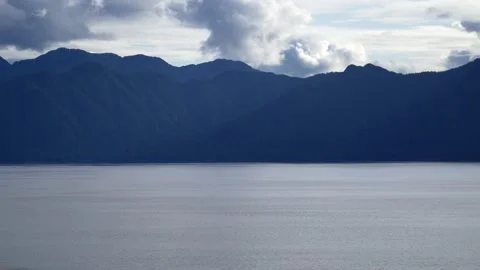 Mountain Range Silhouette And Ocean In Pacific Northwest Stock Footage 234022689