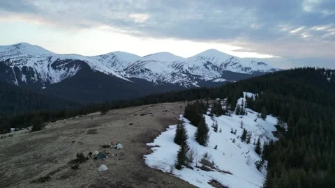 A mountain range with a small tent on the top of it, Chornohora with Hoverl.. Stock Footage 240653401