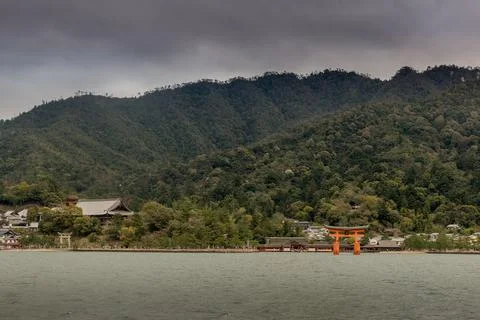 A mountain range with a small town in the valley Stock Photos