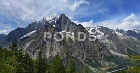 Mountain range in a summer day Stock Photos