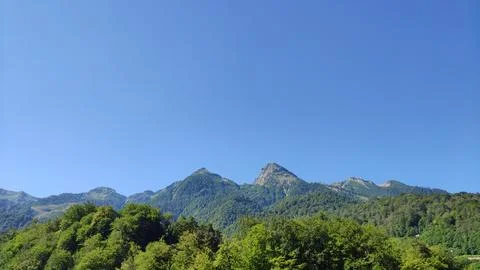 Mountain range in the summer at noon 写真素材