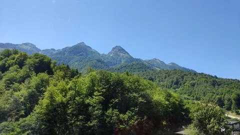 Mountain range in the summer at noon 写真素材