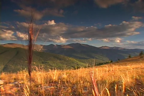 Mountain Range - sunny day, clouds Stock Footage 266574