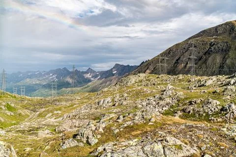 A mountain range in the Swiss Alps with a cloudy sky Stock Photos