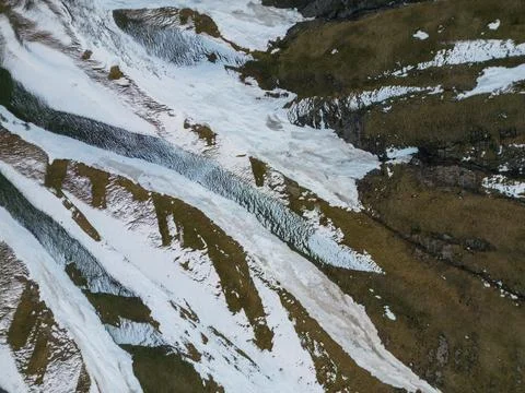 Mountain range texture, snow and stones top view, aerial view Stock Photos