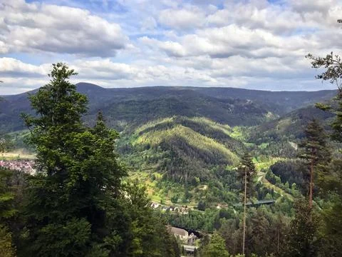 Mountain range with a town in the valley below Stock Photos