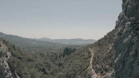 The mountain range is traversed by a path Stock Footage 280504185
