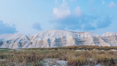 Mountain range under cloudy sky Stock Photos