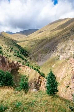 A mountain range with a valley in between Stock Photos