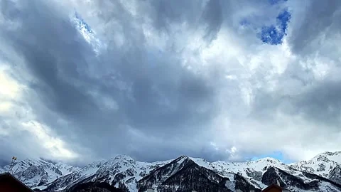 A mountain range is visible in the background with a cloudy sky Stock Footage 277257871