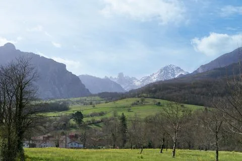 A mountain range is visible in the distance, with a small town in the foreg.. Stock Photos