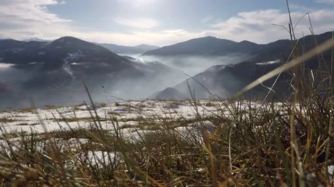 On a mountain range in winter, cloudy, time-lapse 動画素材 146334001