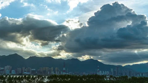 Mountain Ranges with Shifting Tyndall Rays and Cloud Shadows Timelapse Stock Footage 320289186
