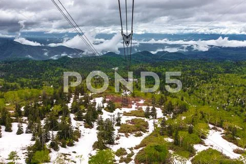 Mountain ranges view from asahidake ropeway Stock Photo #43249525
