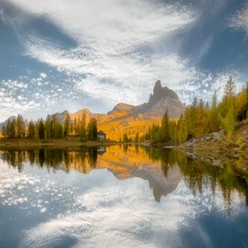Mountain reflection in an alpine lake, Dolomites, Italy Stock Photos