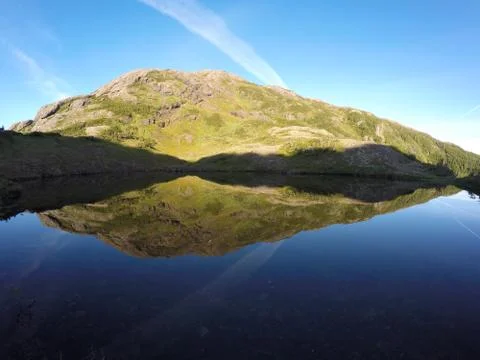 Mountain &amp; Reflection In Glassy Pond Stock Photos