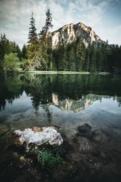Mountain reflection in a lake in austria during autumn Stock Photos