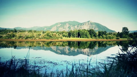 Mountain reflection on a lake Stock Footage 43061328