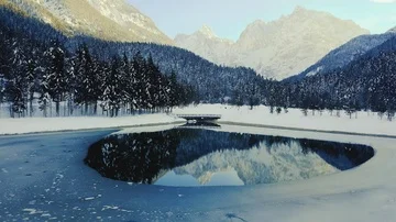 Mountain reflection in a lake Stock Footage 85730015