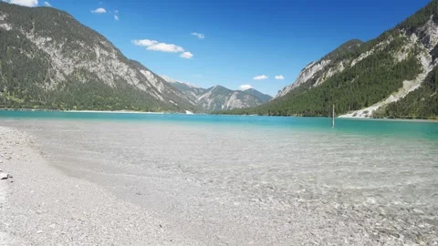 Mountain Reflections and Wild Nature at Plansee Lake in Austria  A Hidden Wat Stock Footage 308648396