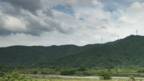Mountain Region Dark Clouds Building over Ridges Timelapse Stock Footage 320989101