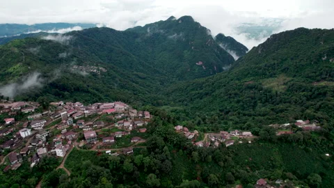 Mountain ridge and clouds in rural jungle bush forest. Ban Phahee Stock Footage 210676839
