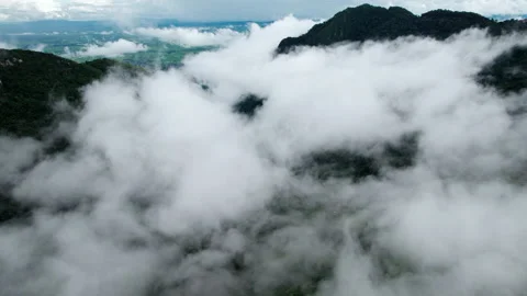 Mountain ridge and clouds in rural jungle bush forest. Ban Phahee Stock Footage 210678038