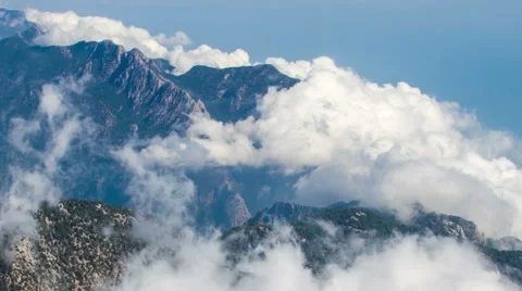 Mountain Ridge and Clouds Timelapse Stock Footage 55437967