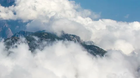 Mountain Ridge and Clouds Timelapse Stock Footage 55437984