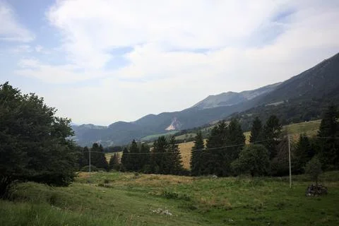 Mountain ridge and meadows Stock Photos