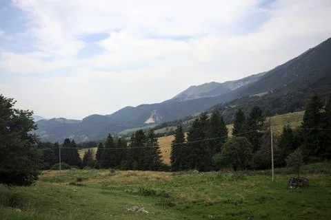 Mountain ridge and meadows Stock Photos