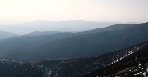 Mountain Ridge and Snow Covered Mountains. Pan View Video stock 71795156