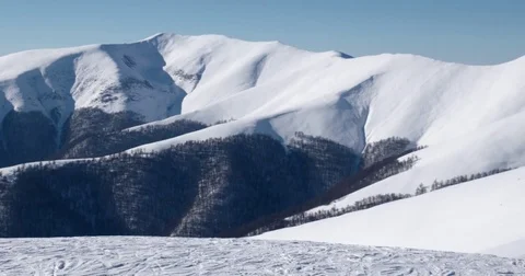 Mountain Ridge and Snow Covered Mountains and Rural Landscape in Winter Sunny 動画素材 72337039