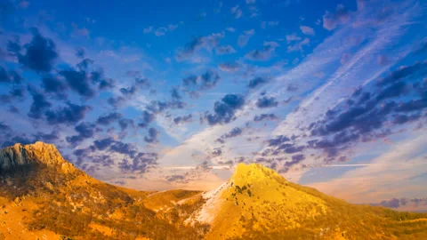 Mountain ridge at the dramatic sunset time lapse scene Stock Footage 155107055