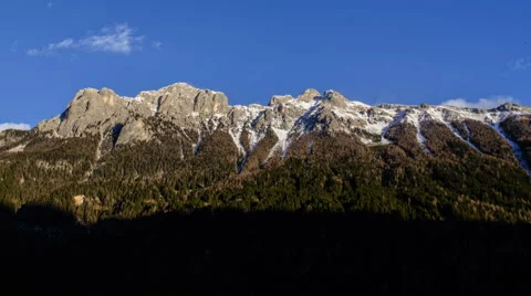 Mountain ridge, snow blown over summit, high winds Stock Footage 46131946