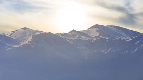 Mountain ridge in snow at the sunset time lapse scene Video stock 159278627