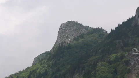 Mountain Ridge with Storm Clouds Moving Across Stock-Footage 53007791