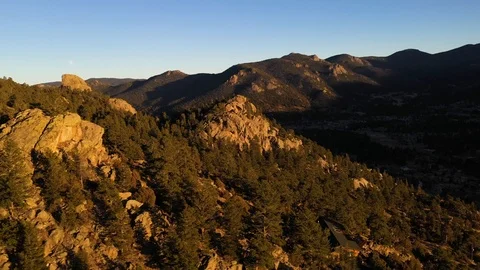 Mountain Ridge With Trees Sunset Drone Shot 4K 스톡 동영상 119835407