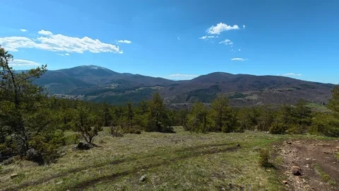 Mountain ridge under bright blue sky. Balkan, Eastern Europe, POV Video stock 333440558