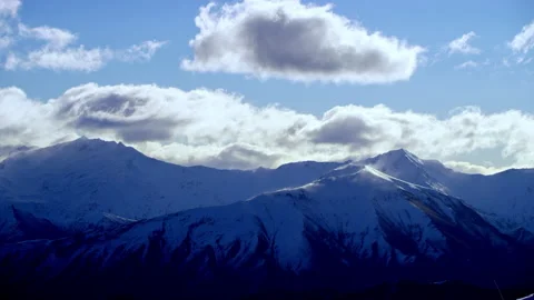 Mountain ridgeline with clouds above Stock Footage 159717082