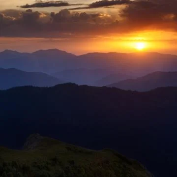 Mountain ridges at sunset Stock Photos