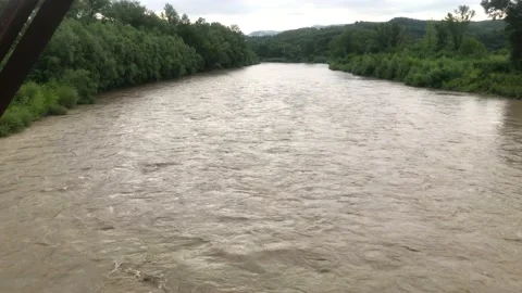 Mountain river after rain. Full-flowing mountain river after rain. river after Stock Footage 205411139