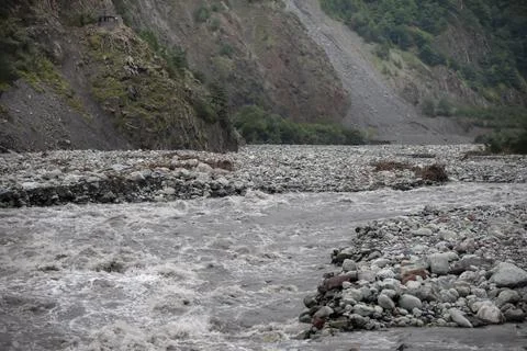 Mountain river against the background Stock Photos