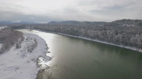 Mountain river among the winter forest in Siberia, aerial shot 4K Stock Footage 57250544