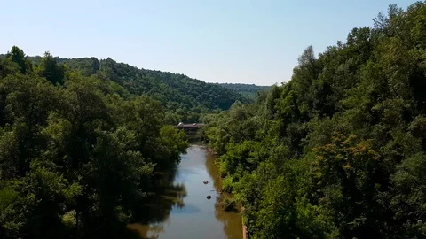 Mountain River And Bridge With Vehicles Stock Footage 83474759