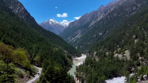 Mountain river and glacier in the background. 스톡 동영상 283245942